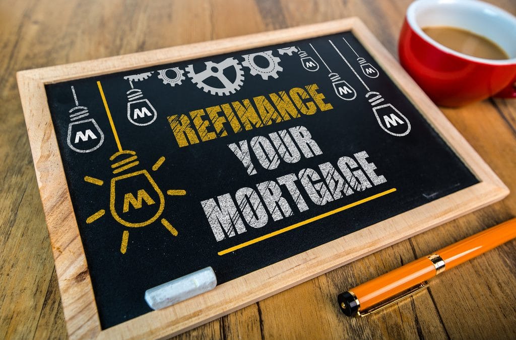 An image of a chalk board prompting "Refinance Your Mortgage"