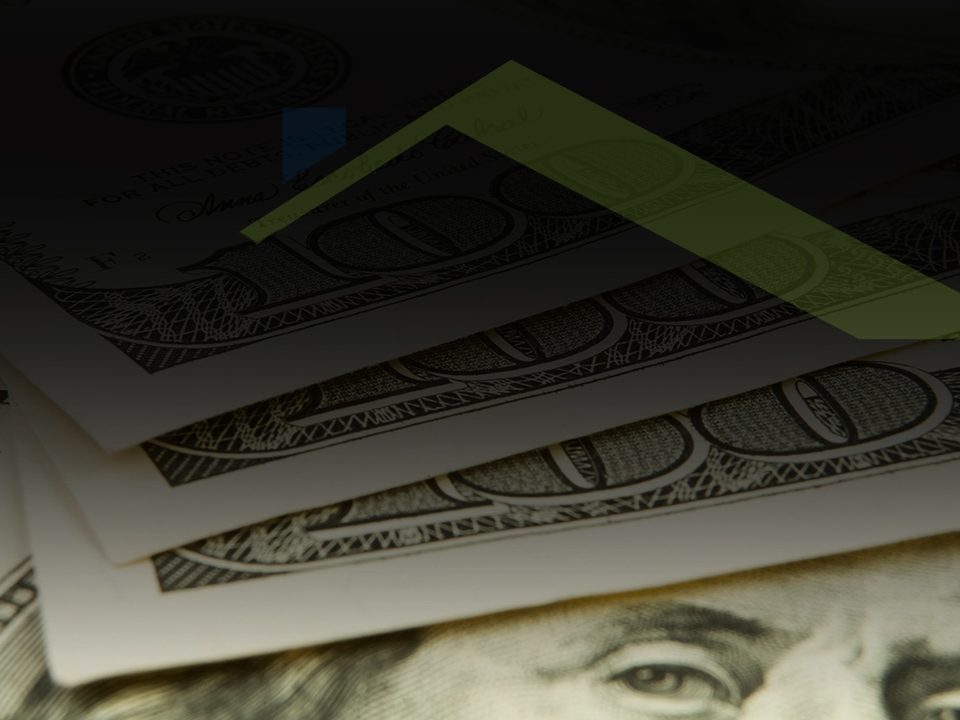 A few stacked one hundred dollar bills